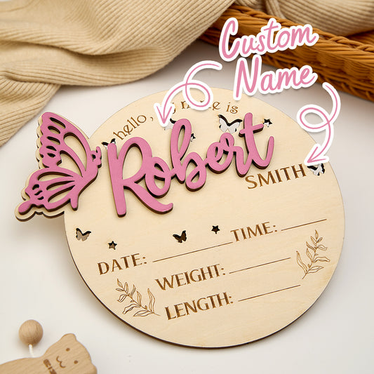 Personalised Butterfly Birth Announcement Sign wooden photo prop showing engraved name and birth details on butterfly-shaped plaque, newborn photography prop and nursery keepsake