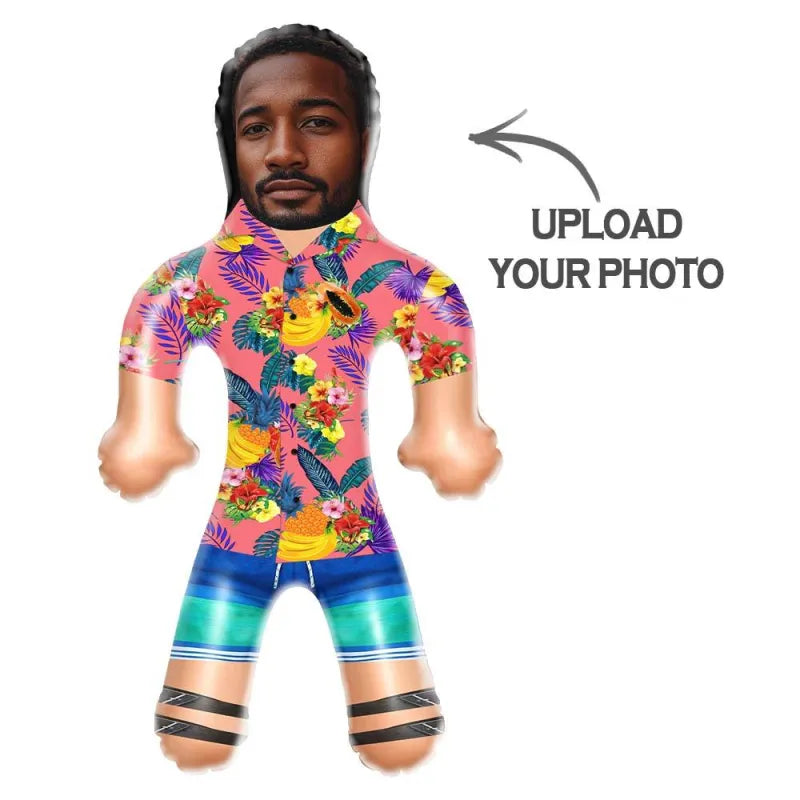 Close-up of personalised inflatable doll showing custom face design on a tropical shirt