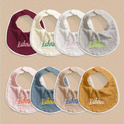 Rear view showing secure fastening and comfortable fit of a personalised embroidered baby bib — practical newborn essential