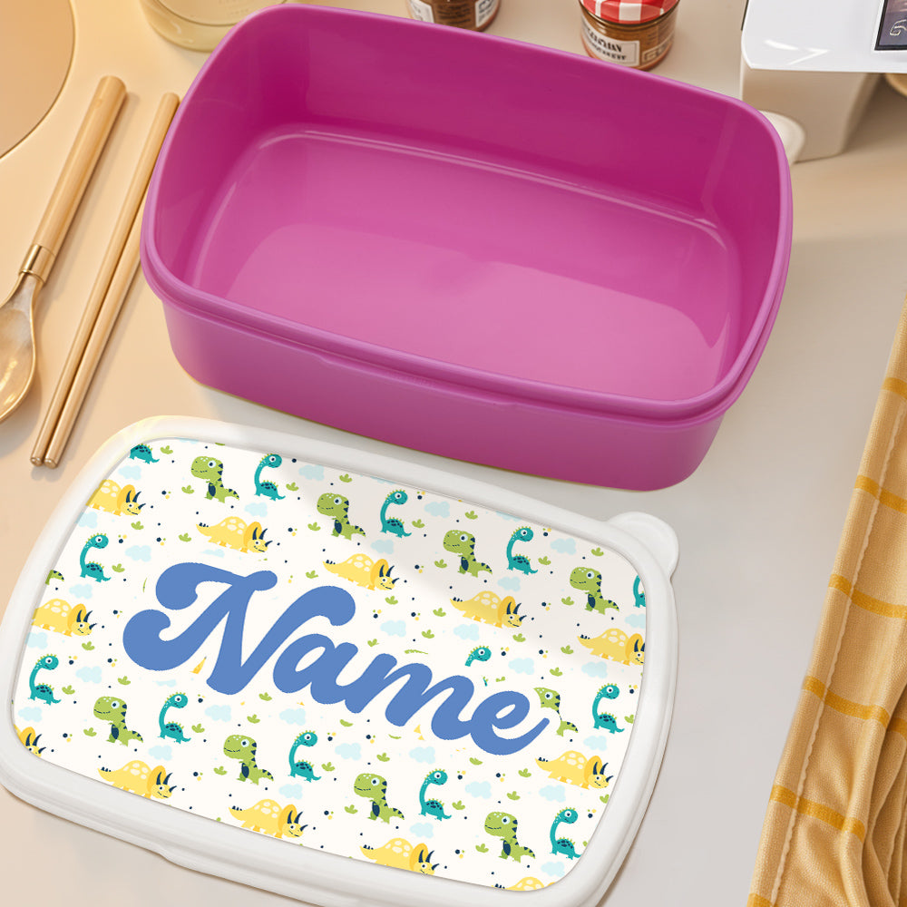 Open personalised dinosaur lunch box showing roomy interior and compartments — practical custom name lunchbox for school or nursery