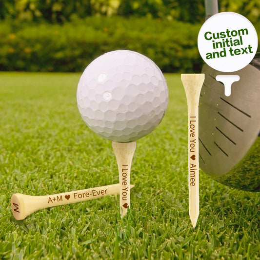 Personalised engraved bamboo golf tees - close-up of laser-engraved wooden tee with custom text for golf training and gifts