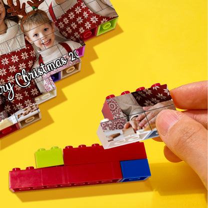 Assembled set of personalised photo building bricks forming a rebuildable memorial display with family photos — interactive personalised photo building bricks for custom memorial gifts