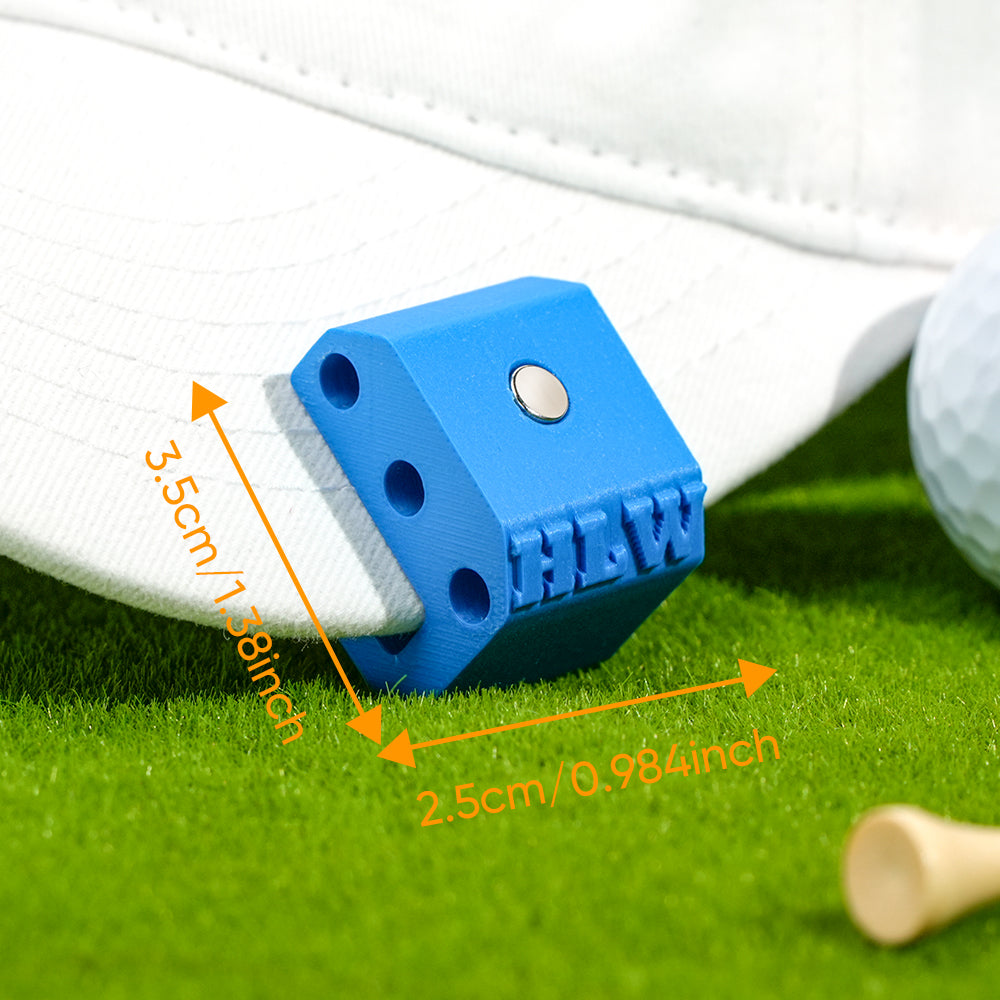 Size reference of personalised 3D printed hat clip in hand (3.5cm × 2.5cm) — compact magnetic golf marker and tees holder