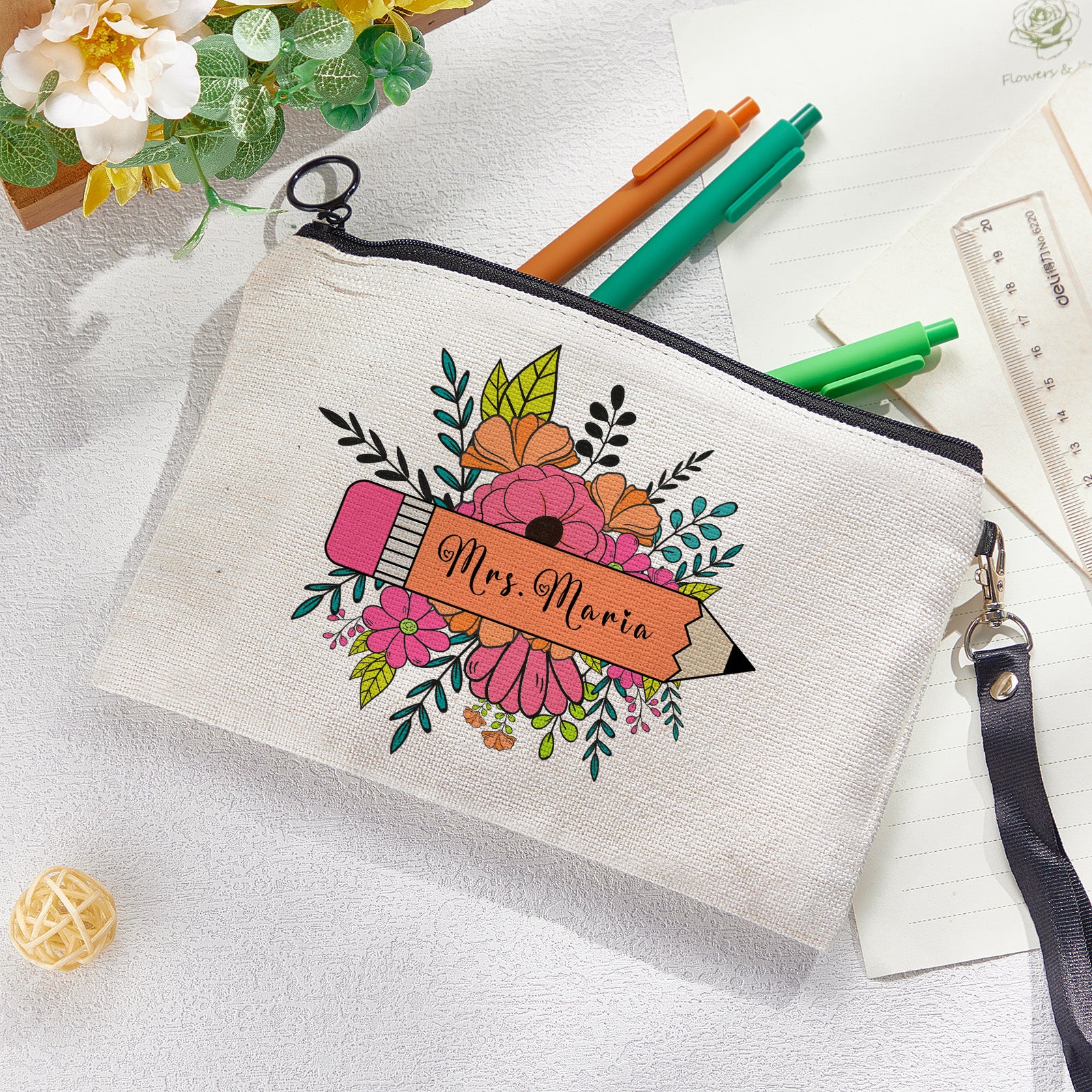 Personalised pouch in hand showing scale, perfect size 22.5 x 15 cm for pencils and cosmetics