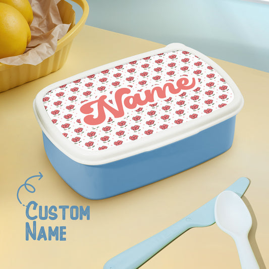 Front view of personalised name lunch box with cute flowers print and custom name — kids school lunch box gift