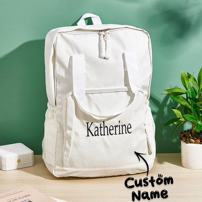 Front view of personalised name embroidered backpack in durable nylon — a stylish custom travel bag gift for friends with spacious main compartment and zip closures
