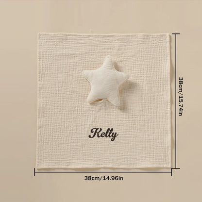 Personalised baby towel laid flat to show full star pattern and placement of embroidered name, perfect newborn keepsake