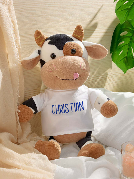 Personalised cow plush toy with custom name on belly, soft huggable newborn keepsake for baby showers and first birthdays
