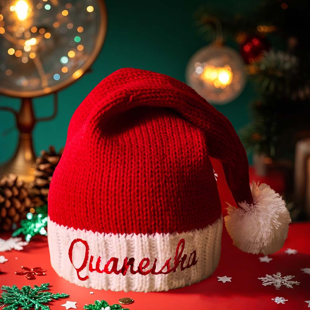 Adult wearing a personalised embroidered Santa hat with a custom name — festive Christmas accessory for him or her