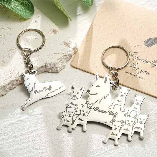 Close-up of a personalised stainless steel wolf family keyring engraved with names — engraved wolf family keyring, perfect personalised family gift