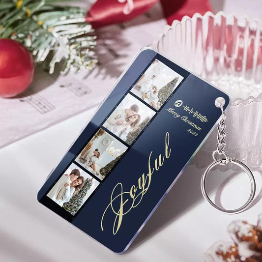 Personalised music code acrylic plaque and matching keychain on white background — clear engraved filmstrip design, scannable to play your chosen song