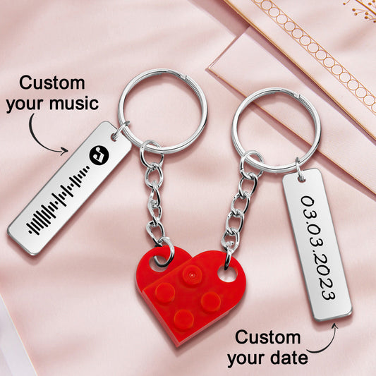 Pair of personalised heart brick keyrings with engraved music code and date‑matching design – perfect couples anniversary gift