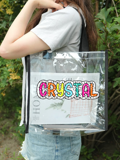 Close-up of personalised name text on clear tote bag, detail of customisation for a memorable bridesmaid gift
