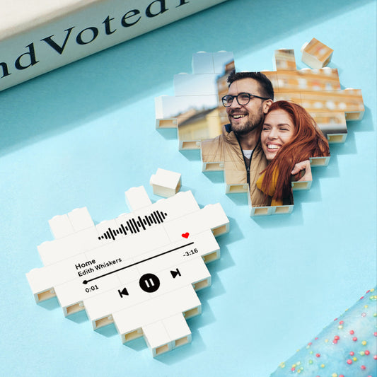 Custom heart-shaped photo block puzzle assembled on a table, personalised building brick keepsake with vibrant UV-printed family photo