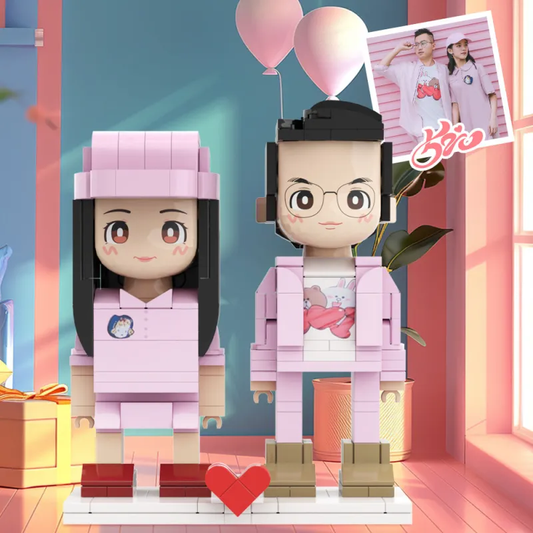 Personalised full‑body 2‑person brick figures standing side by side on a white background — custom couple gift handcrafted from photos in light nougat skin tone, eco‑friendly ABS.