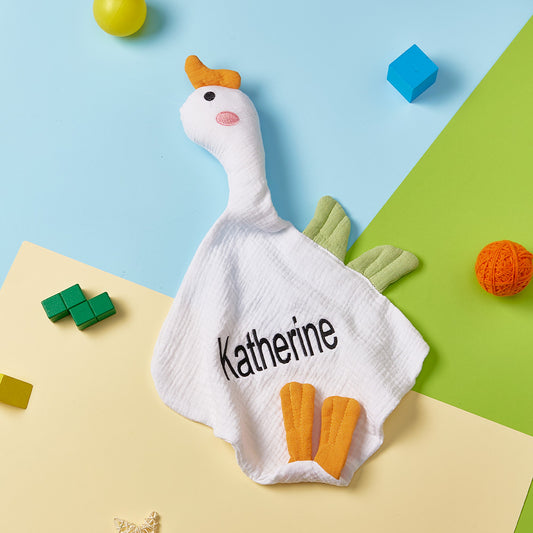 Personalised baby soothing towel flat-lay with embroidered name and soft swan motif — soft cotton personalised swan comforter for newborns