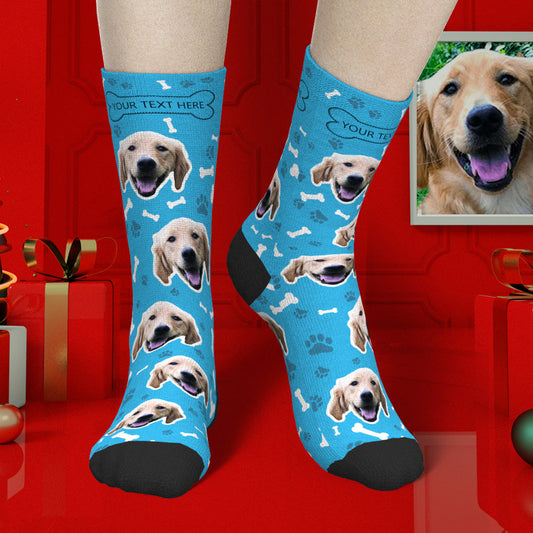 Pair of personalised dog face photo socks showing a high-definition pet portrait on black background — custom photo socks with optional engraved text