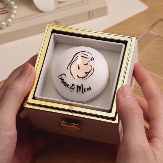 Close-up of realistic cake-shaped candle top with customised text engraving on Custom Music Box Candle Flip Box — perfect anniversary or birthday personalised gift