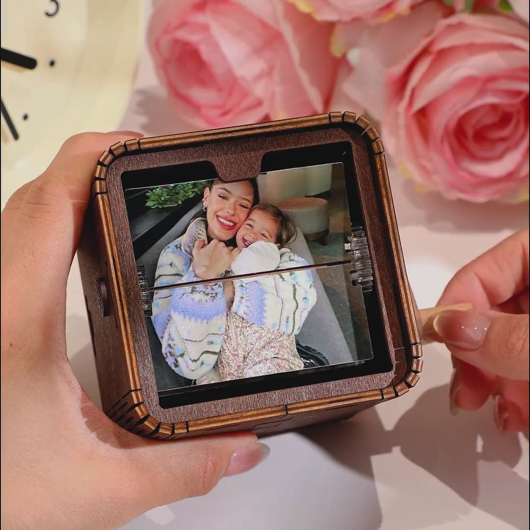 Interior view showing 16 custom photo slots in the flipbook frame for personalised family keepsakes