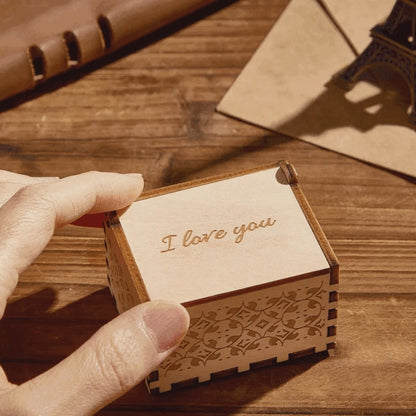 Personalised digital photo music box on a bedside table — a sentimental wooden keepsake gift for anniversaries, Mother's Day or memorials