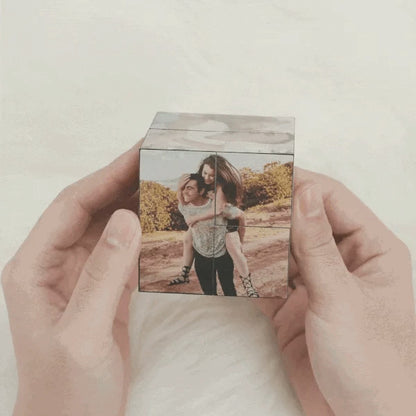 Gift-wrapped personalised infinity folding photo cube presented as a Father's Day gift — charming gifts for him and sentimental keepsakes