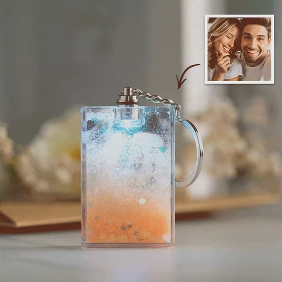 Demonstration of soft LED illumination in low light, highlighting a personalised photo inside the flowing sand keychain