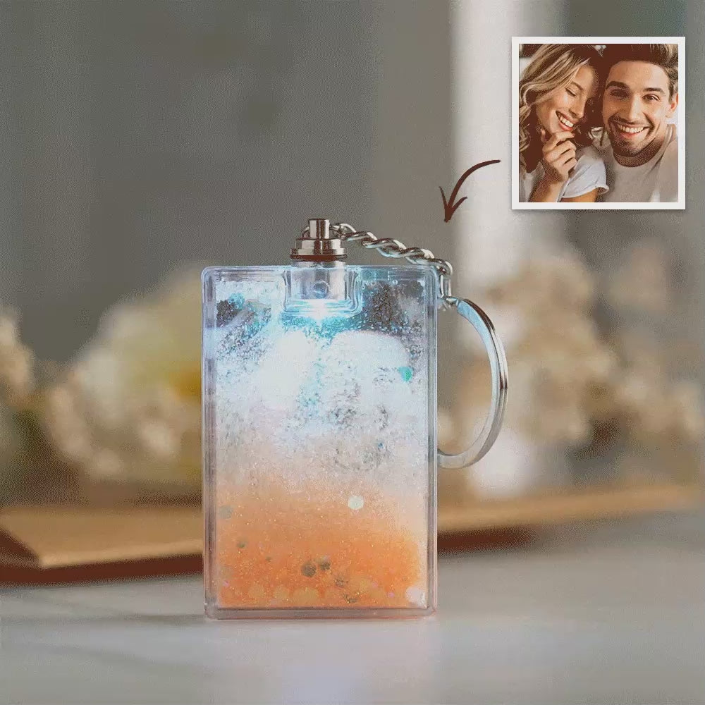 Demonstration of soft LED illumination in low light, highlighting a personalised photo inside the flowing sand keychain